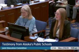 Kenai Peninsula Borough School District Board of Education member Penny Vadla and student representative Emerson Kapp speak to the joint Alaska House and Senate education committees in Juneau, Alaska, on Monday, Feb. 10, 2025. (Screenshot courtesy Gavel Alaska/KTOO)