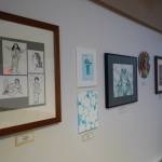 Artwork by Chloe Jacko and other Soldotna High School students is seen as part of the inaugural exhibition of Spirit of Soldotna: Showcasing Student Art in Soldotna City Hall in Soldotna, Alaska, on Wednesday, Feb. 12, 2025. (Jake Dye/Peninsula Clarion)