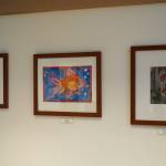 Artwork by Campbell Kincaid, Chloe Jacko and Kylee St. Louis-Bush is seen as part of the inaugural exhibition of Spirit of Soldotna: Showcasing Student Art in Soldotna City Hall in Soldotna, Alaska, on Wednesday, Feb. 12, 2025. (Jake Dye/Peninsula Clarion)