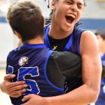 Marcarius Evans of Nanwalek celebrates a victory over Cook Inlet Academy on Saturday, February 15, 2025, at Cook Inlet Academy just outside of Soldotna, Alaska. (Photo by Jeff Helminiak/Peninsula Clarion)