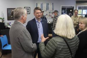 U.S. Rep. Nick Begich III, R-Alaska, talks with supporters during a campaign meet-and-greet Oct. 12, 2024, at the Southeast Alaska Real Estate office near the Nugget Mall. (Mark Sabbatini / Juneau Empire file photo)