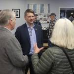 U.S. Rep. Nick Begich III, R-Alaska, talks with supporters during a campaign meet-and-greet Oct. 12, 2024, at the Southeast Alaska Real Estate office near the Nugget Mall. (Mark Sabbatini / Juneau Empire file photo)