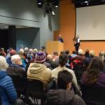 Biologist Heather Renner and Friends of Alaska National Wildlife Refuges board member Poppy Benson facilitate questions from the crowd on Feb. 18, 2025, at the Alaska Maritime National Wildlife Refuge in Homer, Alaska. (Chloe Pleznac/Homer News)