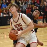 Kenai Centrals Mason Tunseth goes up for a shot against Redingtons Aiden Dobbs on Thursday, February 27, 2025, at Kenai Central High School in Kenai, Alaska. (Photo by Jeff Helminiak/Peninsula Clarion)