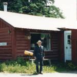 Poopdeck Platt poses in front of his Homer cabin in 1991. (Photo courtesy of the Huebsch Family Collection)