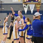 Cook Inlet Academy head coach Josh Hawley celebrates with his team Saturday, March 1, 2025, at the Peninsula Conference tournament at Cook Inlet Academy just outside of Soldotna, Alaska. (Photo by Jeff Helminiak/Peninsula Clarion)