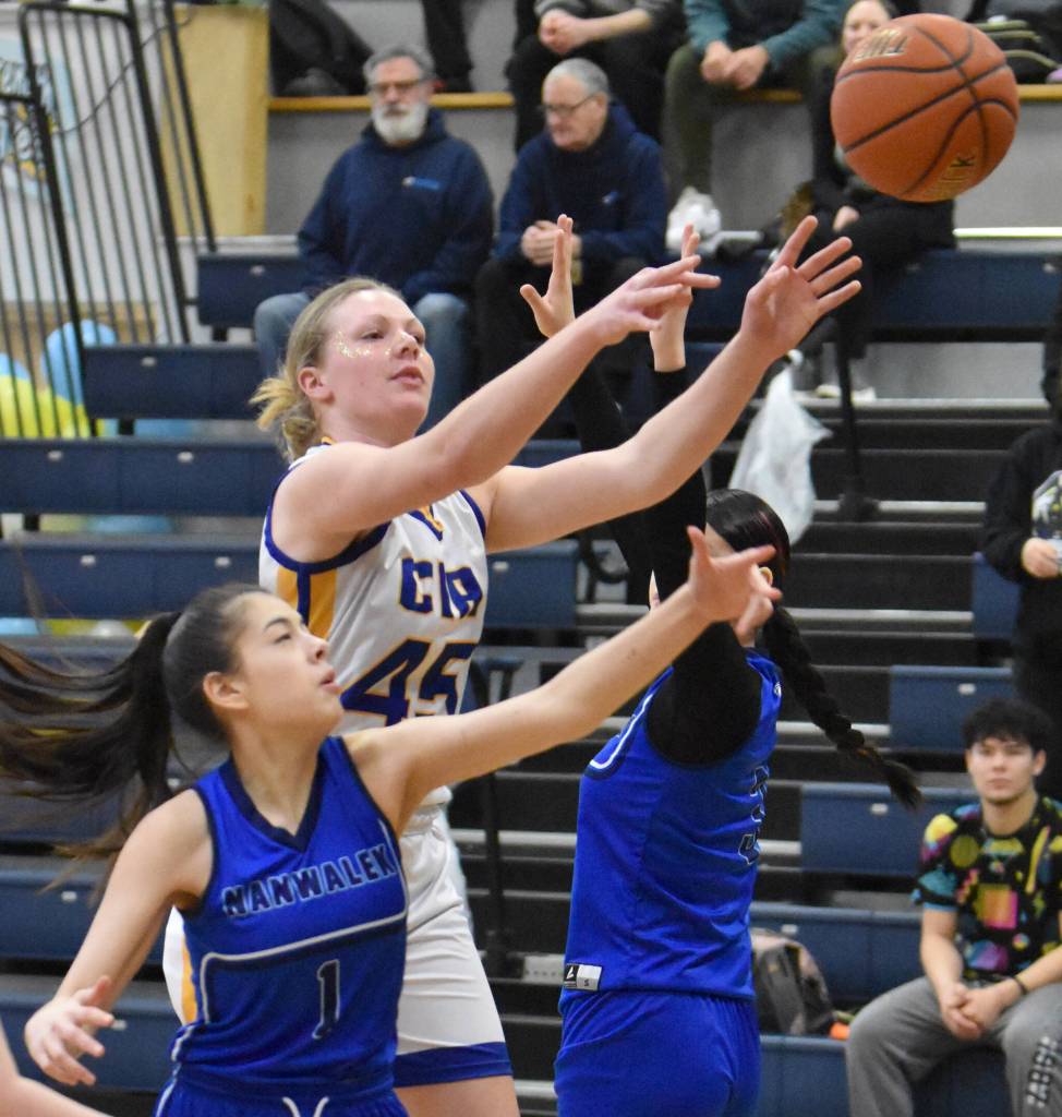 Nanwaleks Alyson Seville and Cook Inlet Academys Ella Rollman battle for the ball Saturday, March 1, 2025, at the Peninsula Conference tournament at Cook Inlet Academy just outside of Soldotna, Alaska. (Photo by Jeff Helminiak/Peninsula Clarion)