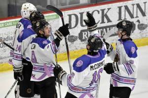 Riley Mullen (9) of the Kenai River Brown Bears is congratulated on his goal Thursday, March 6, 2025, at the Soldotna Regional Sports Complex in Soldotna, Alaska. (Photo by Jeff Helminiak/Peninsula Clarion)