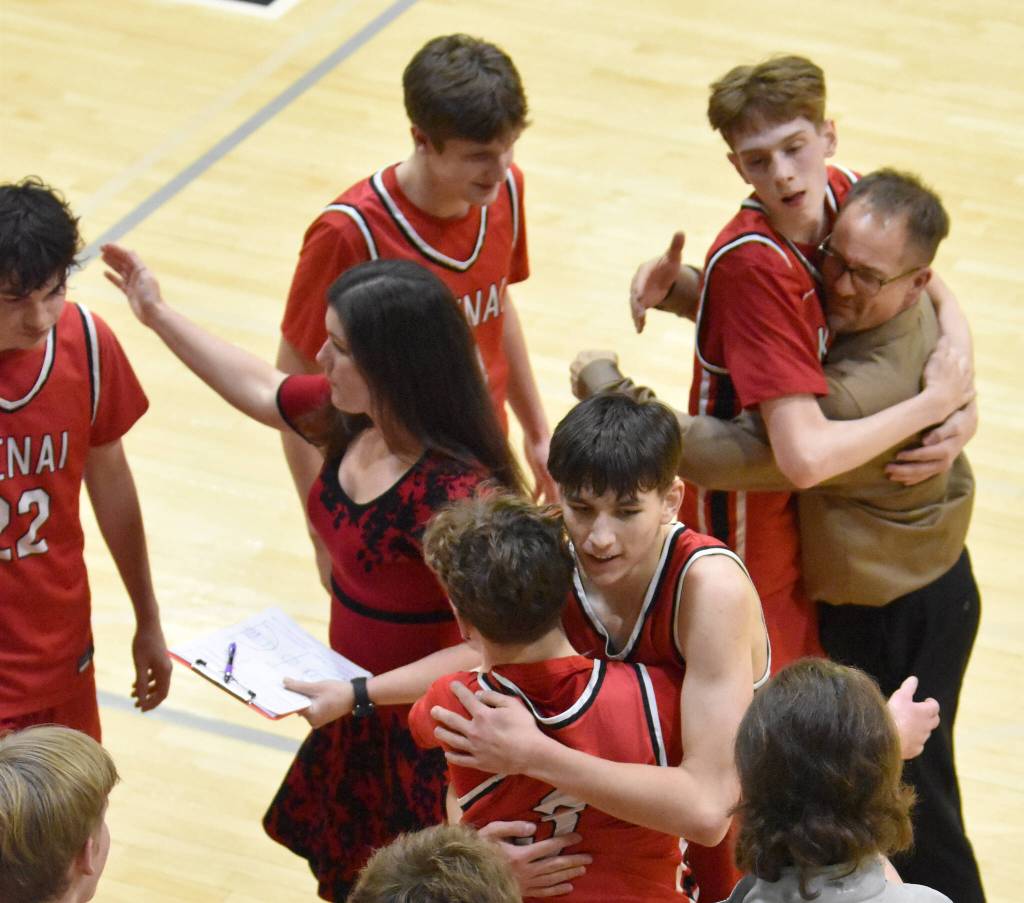 Kenai Central celebrates winning the championship Saturday, March 8, 2025, at the Peninsula Conference tournament at Nikiski Middle-High School in Nikiski, Alaska. (Photo by Jeff Helminiak/Peninsula Clarion)