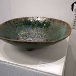 Low Tide by Matthew Bryan Olds is displayed with a third-place ribbon during the opening reception for Infusion at the Kenai Art Center in Kenai, Alaska, on Friday, March 7, 2025. (Jake Dye/Peninsula Clarion)