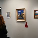 Our Happy Place by Linda Vizenor is displayed with a second-place ribbon during the opening reception for Infusion at the Kenai Art Center in Kenai, Alaska, on Friday, March 7, 2025. (Jake Dye/Peninsula Clarion)