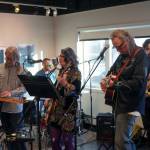 The Tune Weavers perform during the opening reception for Infusion at the Kenai Art Center in Kenai, Alaska, on Friday, March 7, 2025. (Jake Dye/Peninsula Clarion)