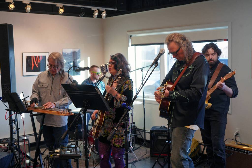 The Tune Weavers perform during the opening reception for Infusion at the Kenai Art Center in Kenai, Alaska, on Friday, March 7, 2025. (Jake Dye/Peninsula Clarion)
