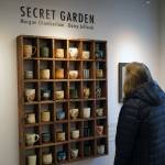 Artwork by Daisy Jeffords and Morgan Chamberlain is displayed as part of Secret Garden during an opening reception at the Kenai Art Center in Kenai, Alaska, on Friday, March 7, 2025. (Jake Dye/Peninsula Clarion)