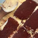 This decadent, creamy tiramisu is composed of layers of coffee-soaked homemade lady fingers and mascarpone cheese with a cocoa powder topping. (Photo by Tressa Dale/Peninsula Clarion)