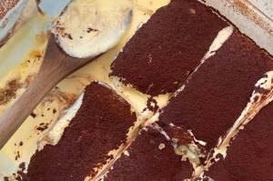 This decadent, creamy tiramisu is composed of layers of coffee-soaked homemade lady fingers and mascarpone cheese with a cocoa powder topping. (Photo by Tressa Dale/Peninsula Clarion)