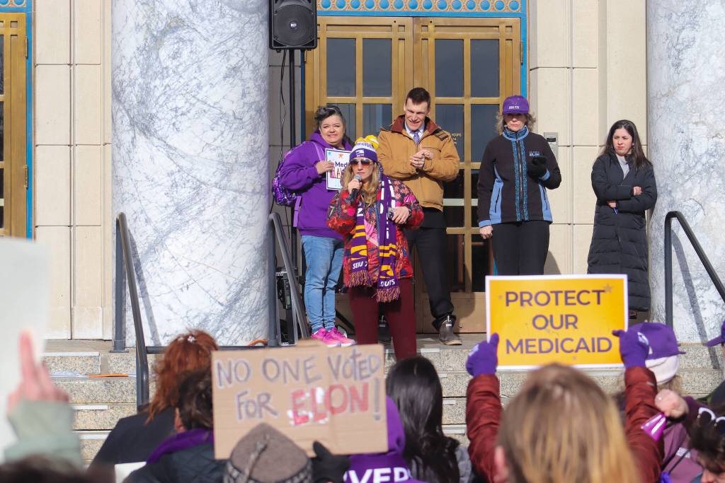 Shaine Truscot, vice president of the caregivers union SEIU 775, leads a chant at a protest against Medicaid cuts on Wednesday, March 12, 2025. (Jasz Garrett / Juneau Empire)