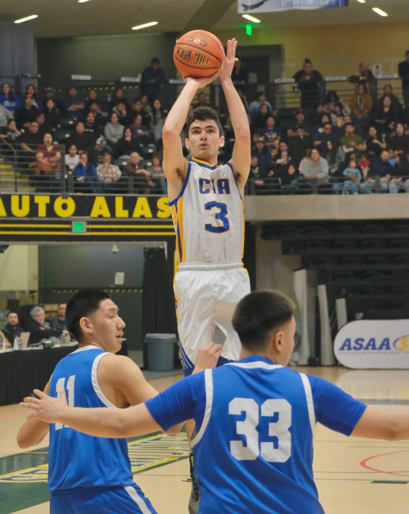 Cook Inlet Academys Ian McGarry (3) scores against Davis-Ramoth on Thursday, March 13, 2025, in the 2025 ASAA March Madness Alaska 1A State Basketball Championships at Anchorages Alaska Airlines Center. (Klas Stolpe / Juneau Empire)