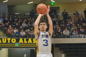 Cook Inlet Academy's Ian McGarry (3) scores against Davis-Ramoth on Thursday, March 13, 2025, in the 2025 ASAA March Madness Alaska 1A State Basketball Championships at Anchorage's Alaska Airlines Center. (Klas Stolpe / Juneau Empire)