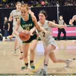 Sewards Natalie Sieminski (15) and Unalakleets Lizabeth Ivanoff (2) go for a loose ball during the Seahawks 32-29 semifinal win Friday, March 14, 2025, in the 2025 ASAA March Madness Alaska 2A State Basketball Championships at Anchorages Alaska Airlines Center. (Klas Stolpe / Juneau Empire)