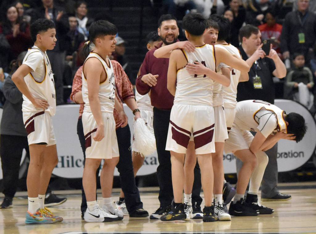 Shaktoolik celebrates defeating Cook Inlet Academy at the Class 1A boys state championship game Saturday, March 15, 2025, at the Alaska Airlines Center in Anchorage, Alaska. (Photo by Jeff Helminiak/Peninsula Clarion)