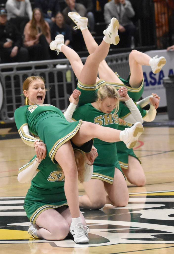 The Seward cheerleaders perform at halftime at the Class 2A girls state championship game Saturday, March 15, 2025, at the Alaska Airlines Center in Anchorage, Alaska. (Photo by Jeff Helminiak/Peninsula Clarion)