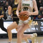 Sewards Grace Fleming drives on Glennallens Cheyenne Fields at the Class 2A girls state championship game Saturday, March 15, 2025, at the Alaska Airlines Center in Anchorage, Alaska. (Photo by Jeff Helminiak/Peninsula Clarion)