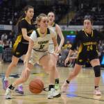 Sewards Addison Lemme drives on Glennallen at the Class 2A girls state championship game Saturday, March 15, 2025, at the Alaska Airlines Center in Anchorage, Alaska. (Photo by Jeff Helminiak/Peninsula Clarion)