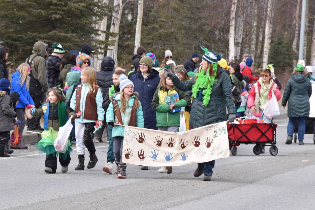 Girl scouts participate in the Sweeneys St. Patricks Day Parade, Monday, March 17, 2025, in Soldotna, Alaska. (Photo by Erin Thompson/Peninsula Clarion)