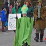 A youth dresses up for the Sweeneys St. Patricks Day Parade, Monday, March 17, 2025, in Soldotna, Alaska. (Photo by Erin Thompson/Peninsula Clarion)