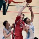 Kenais Mason Tunseth (33) battles for a rebound with Valdezs Jarrett Gage and Romen Weber (13) during the Kardinals 71-49 loss to the Buccaneers on Friday, March 21, 2025, in the 4th/6th place game of the 2025 ASAA March Madness Alaska 3A/4A Basketball State Championships at the Alaska Airlines Center in Anchorage, Alaska. (Klas Stolpe / Juneau Empire)