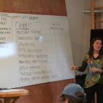 Cook Inletkeeper Central Peninsula Regional Director Kaitlin Vadla speaks during a Local Solution meeting focused on salmon at the Cook Inletkeeper Community Action Studio in Soldotna, Alaska, on Thursday, March 20, 2025. (Jake Dye/Peninsula Clarion)