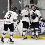 Carter McCormick (far right) of the Kenai River Brown Bears celebrates his goal with Gavin Jensen and Dario Lass on Saturday, March 22, 2025, at the Soldotna Regional Sports Complex in Soldotna, Alaska. (Photo by Jeff Helminiak/Peninsula Clarion)