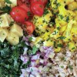 Sweet potatoes, tomatoes, cauliflower, kale, onions and buckwheat are served in this rich, healthy salad. (Photo by Tressa Dale/Peninsula Clarion)