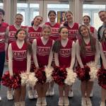The Kenai Central cheerleading team. Back row, left to right: Luis Saravia, Sylvia McGraw, Kimber Moore, Makenzie Harden, Christine Goering, Sarah Baisden and Hollan Chadwick. Front row, left to right: Cara Graves, Mackenzie Fann, Ellee Pancoast, Ella Siemers and Kayani Whicker. (Photo provided)