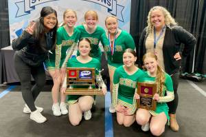 The Seward cheerleading team. From left to right are head coach Jean Beck, freshman Sophia Hughes, junior Somi Clendaniel, junior co-captain Juniper Ingalls, junior captain Lola Swanson, sophomore Josie Andrews, sophomore Addison Gerlach and assistant coach Brittany Swanson. (Photo provided)