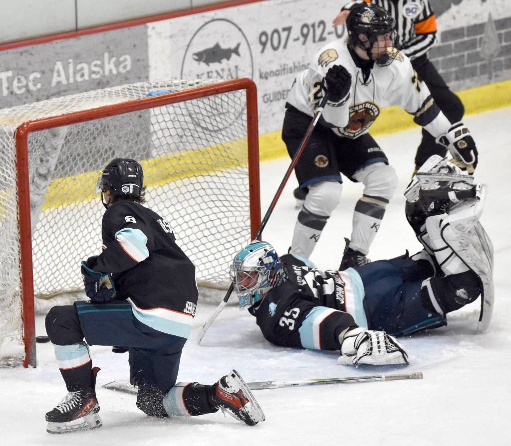 Dylan Gillespie of the Kenai River Brown Bears scores on William Lubimov of the Anchorage Wolverines on Friday, April 4, 2025, at the Soldotna Regional Sports Complex in Soldotna, Alaska. (Photo by Jeff Helminiak/Peninsula Clarion)