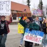 Protesters stand along the Sterling Highway in Soldotna, Alaska, participating in the Remove, Reverse, Reclaim protest organized by Many Voices and Kenai Peninsula Protests as part of the nationwide 50501 effort on Saturday, April 5, 2025. (Jake Dye/Peninsula Clarion)