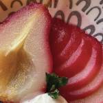 These poached pears get their red tinge from a cranberry juice bath. (Photo by Tressa Dale/Peninsula Clarion)