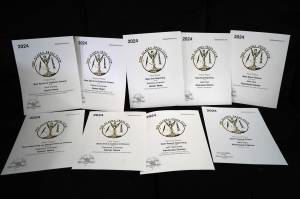 Awards earned by Peninsula Clarion and Homer News writers Delcenia Cosman, Jake Dye, Jeff Helminiak and Nick Varney are displayed on Sunday. (Jake Dye/Peninsula Clarion)