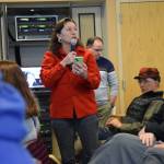 Local business owner Shannon McBride-Morin addresses the crowd and Rep. Sarah Vance on Saturday, April 12, 2025. (Chloe Pleznac/Homer News)