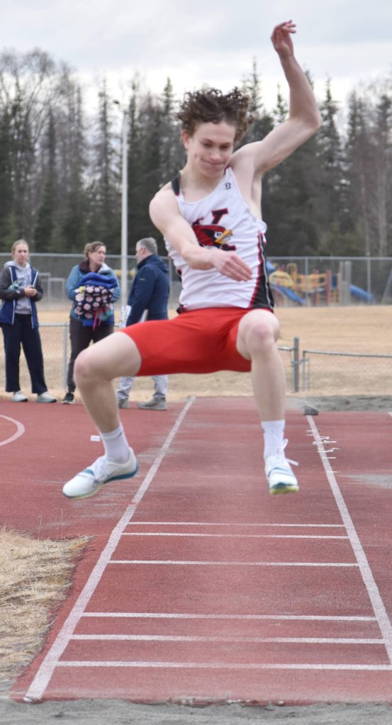 Kenai Centrals Aidan Jackman competes in the long jump at the Soldotna Mini Meet on Tuesday, April 15, 2025, at Soldotna High School in Soldotna, Alaska. (Photo by Jeff Helminiak/Peninsula Clarion)