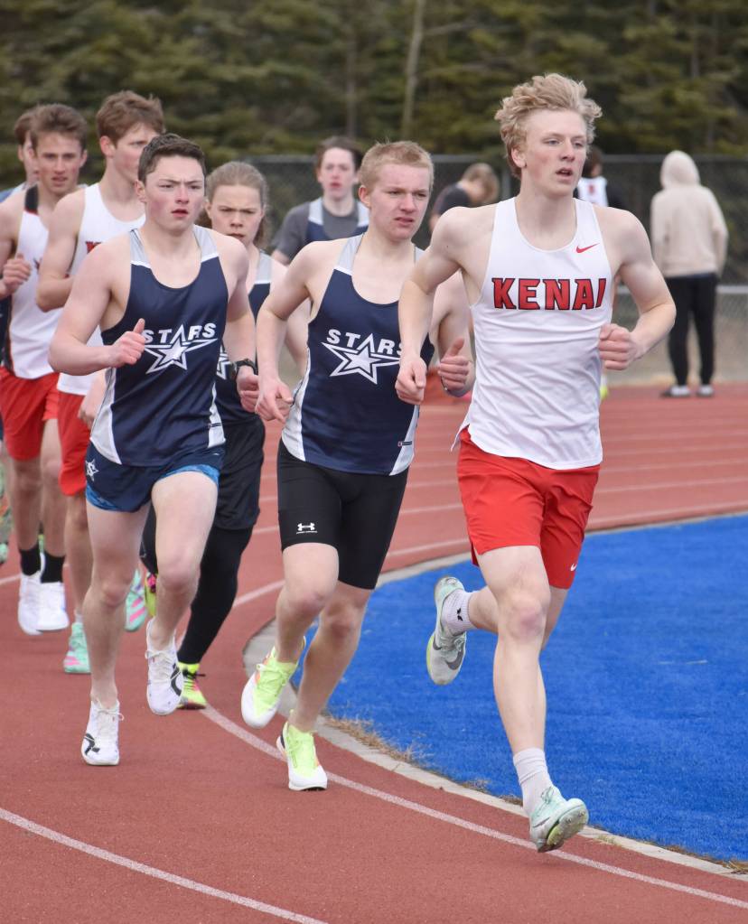 Kenai Centrals Chase Laker leads Soldotnas Ollie Dahl and Michael Davidson in the 1,600-meter run at the Soldotna Mini Meet on Tuesday, April 15, 2025, at Soldotna High School in Soldotna, Alaska. (Photo by Jeff Helminiak/Peninsula Clarion)