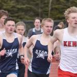 Kenai Central's Chase Laker leads Soldotna's Ollie Dahl and Michael Davidson in the 1,600-meter run at the Soldotna Mini Meet on Tuesday, April 15, 2025, at Soldotna High School in Soldotna, Alaska. (Photo by Jeff Helminiak/Peninsula Clarion)