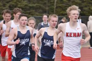 Kenai Central's Chase Laker leads Soldotna's Ollie Dahl and Michael Davidson in the 1,600-meter run at the Soldotna Mini Meet on Tuesday, April 15, 2025, at Soldotna High School in Soldotna, Alaska. (Photo by Jeff Helminiak/Peninsula Clarion)