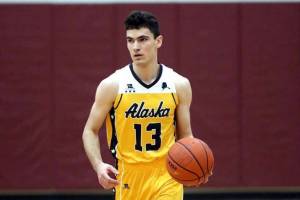 Cook Inlet Academy senior Ian McGarry brings the ball down the floor for the 1A/2A Boys Gold team during the Alaska Association of Basketball Coaches All-Star Games on Saturday, April 12, 2025, at Grace Christian School in Anchorage, Alaska. (Bruce Eggleston/matsusports.net)
