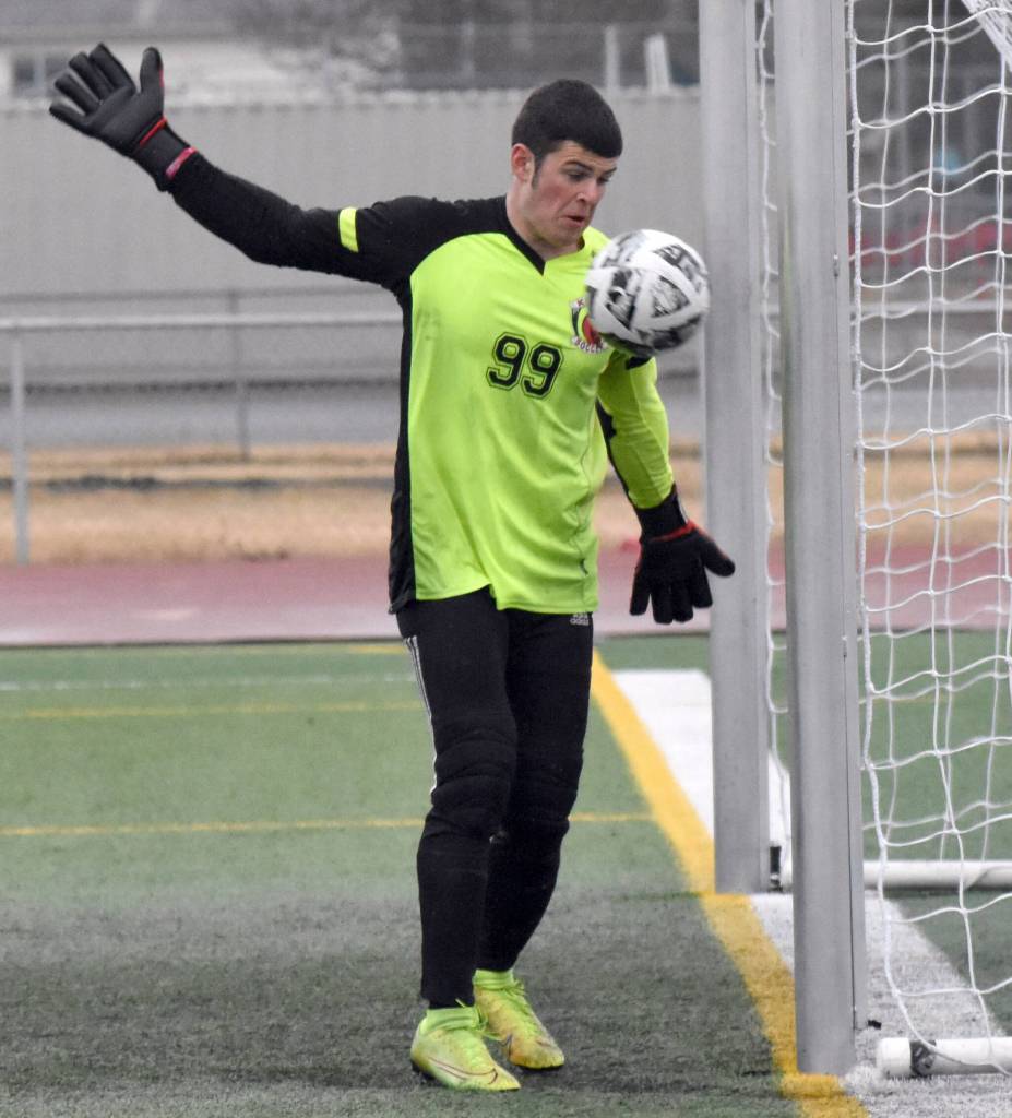 Kenai Centrals Bradley Morrison lets the ball go out for a goal kick Thursday, April 17, 2025, at Ed Hollier Field at Kenai Central High School in Kenai, Alaska. (Photo by Jeff Helminiak/Peninsula Clarion)