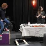 Audrey Hobart-Anderson and Rebecca Pioch create live sound effects during a rehearsal of Our Town in the Soldotna High School Auditorium in Soldotna, Alaska, on Friday, April 18, 2025. (Jake Dye/Peninsula Clarion)