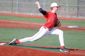 Kenai Centralճ Jacob Joanis delivers a pitch during a high school baseball game against Kodiak on Friday, April 18, at Baranof Field in Kodiak, Alaska. (DEREK CLARKSTON/Kodiak Daily Mirror)