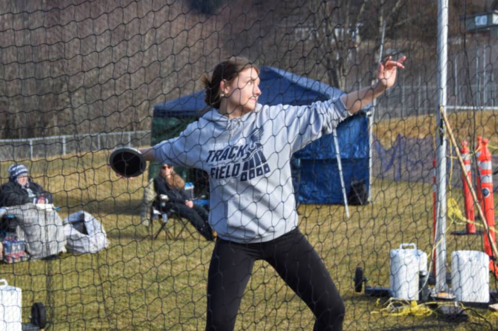 A Soldotna athlete pulls back for her discus throw on Friday, April 18 at the Homer High School Invitational Track Meet. (Chloe Pleznac/Homer News)